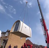 crean lifting a medium sized garden pod